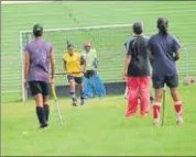  ?? DEEPAK GUPTA ?? Players practise hockey on grass at UP Sports Hostel.