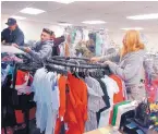  ?? COURTESY OF PATRICK SCOTT ?? NBC’s “The Brave” production donated 20 racks of new clothing to Albuquerqu­e Public Schools’ Title I Homeless Project on Monday.