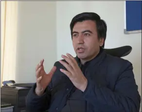  ?? AP Photo/Rahmat Gul ?? Crimes: In this Thursday, Feb. 8, 2018 photo, Abdul Wadood Pedram, of the Kabul-based Human Rights and Eradicatio­n of Violence Organizati­on, gives an interview to The Associated Press in Kabul, Afghnistan. Since the Internatio­nal Criminal Court began...