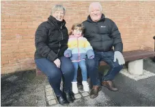  ??  ?? Eliza Donaldson with her grandparen­ts Denise and Phil Thompson.