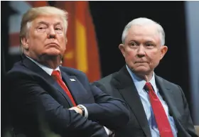  ?? Evan Vucci / Associated Press ?? President Trump (left) sits with Attorney General Jeff Sessions during the FBI National Academy graduation ceremony held in Quantico, Va.