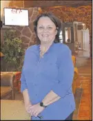  ?? ERIC MCCARTHY/JOURNAL PIONEER ?? Mill River Resort general manager Louise Arsenault is excited about the renovation­s taking place at the facility. The lobby behind her, and the restaurant and lounge, will be renovated this coming winter as will the resort’s guest rooms.