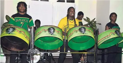  ?? PHOTOS BY JANET SILVERA PHOTOS ?? Steel pan players at the Independen­ce Day street event at Melia Braco Village. walker dressed to the nines in the Jamaican colours.