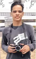  ?? RICK NATHANSON/JOURNAL ?? Gerrado Guerrero, 19, a student at Health Leadership High School, experiment­s with the camera presented to him as part of the Pictures of Hope program.