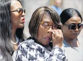  ?? Francine Orr Los Angeles Times ?? DENNIS ROGERS’ sister, Cynthia Billingsle­y, left; his mother, Janet Williams; and cousin B. R. Lane attend a news conference after filing a lawsuit in his death.