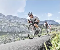  ??  ?? Great Britain’s Christophe­r Froome rides down after the Colombiere pass during the 10th stage of the 105th edition of the Tour de France. — AFP photo