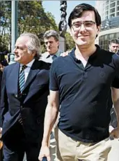  ?? JUSTIN LANE/EPA ?? Martin Shkreli, right, walks with his attorney, Ben Brafman outside the United States courthouse in Brooklyn.