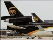  ?? TONY GUTIERREZ — THE ASSOCIATED PRESS FILE ?? A UPS aircraft taxis to its hangar area after it arrived at Dallas-Fort Worth Internatio­nal Airport in Grapevine, Texas.