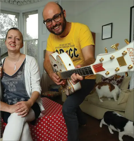  ?? Picture: Colin Mearns ?? Sarah-May Philo at home in Glasgow with fiance Paul Griffin, left and friend Rik Evans, right