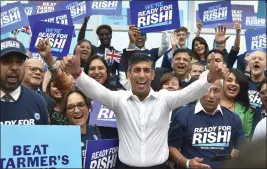  ?? RUI VIEIRA — THE ASSOCIATED PRESS FILE ?? Rishi Sunak meets supporters as he arrives to attend a Conservati­ve Party leadership election hustings at the
