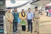  ?? HT ?? Parents of critically ill Assam boy with Guwahati’s top cops before takeoff in air ambulance to Delhi.