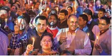  ?? PHOTO: PTI ?? IAS officers and other officials take part in a candleligh­t protest against the alleged manhandlin­g of Delhi Chief Secretary Anshu Prakash by an AAP MLA, at Rajghat in New Delhi on Tuesday