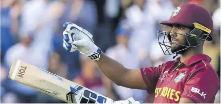  ?? (Photo: AFP) ?? West Indies’ Nicholas Pooran celebrates after scoring a century during the 2019 Cricket World Cup group stage match agaist Sri Lanka at the Riverside Ground, in Chester-le-street, north east England, in this July 1, 2019 file photo.