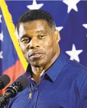  ?? BEN GRAY AP ?? Herschel Walker finished a close second to Warnock in last month’s election, forcing today’s runoff.