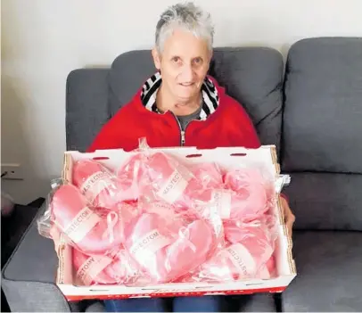  ?? Photo / Supplied ?? Breast cancer survivor Raewyn Porter with mastectomy pillows that will be donated by Dannevirke’s Elske Centre to the Breast Cancer Foundation.