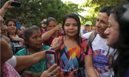  ??  ?? Imelda Cortez, centre, is accompanie­d by relatives after she was acquitted and released, outside the judicial centre for sentencing in Usulután, El Salvador. Photograph: Marvin Recinos/AFP/Getty Images