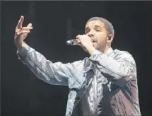  ?? Mark Metcalfe
Getty Images ?? RAPPER DRAKE shares an emotional quality with Jack White that should resonate with a Coachella crowd willing to cross over.