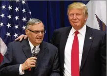  ?? MARY ALTAFFER / ASSOCIATED PRESS 2016 ?? Sheriff Joe Arpaio of Maricopa County, Ariz., joins then-candidate Donald Trump at a January 2016 campaign rally in Marshallto­wn, Iowa. Arpaio was convicted last month of defying a judge’s immigratio­n order.