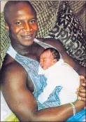  ??  ?? Sheku Bayoh with son Isaac