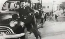  ?? The New York Times ?? ■ In an undated photo via the Shoshan family, Isaac with the car he used as a taxi in Beirut to provide cover for his spying.