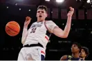  ?? Stier/Getty Images ?? Donovan Clingan and the UConn Huskies are hot favorites to become the first NCAA men’s basketball repeat champions since the Florida Gators in 2007. Photograph: Sarah