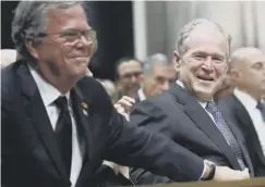  ??  ?? 0 Jeb and George W Bush celebrated their father’s life