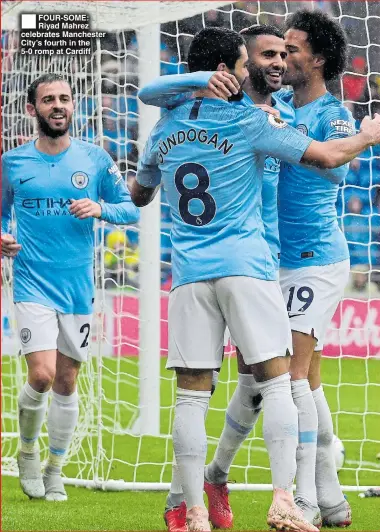  ??  ?? FOUR-SOME: Riyad Mahrez celebrates Manchester City’s fourth in the 5-0 romp at Cardiff