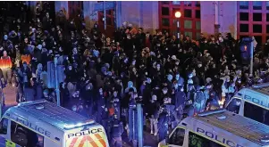  ?? Pic: Andrew Matthews/PA Wire ?? Riot police moving down Rupert Street in Bristol towards protesters on March 21 last year