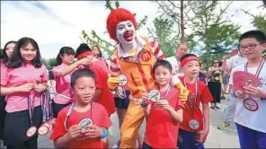  ?? PROVIDED TO CHINA DAILY ?? About 10,000 participan­ts joined the fourth McHappy Run held by McDonald’s China on Aug 26 at Beijing Expo Park to help families of child patients seeking out-of-town medical treatment.