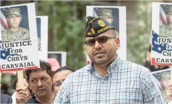  ?? PAT NABONG/SUN-TIMES FILE ?? Chris Garibay, senior vice commander of American Legion Post 939, speaks during an Aug. 13 protest demanding justice for murder victim Chrys Carvajal.