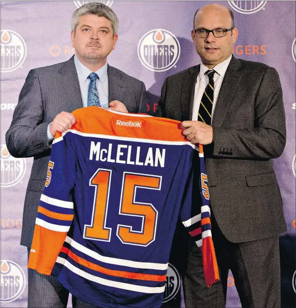 ?? — CP ?? Todd McLellan, left, with Oilers GM Peter Chiarelli, says as an opposing coach he saw an Edmonton team that could light up the scoreboard, but also one that would crumble if they fell behind too early. Mental toughness is something the team needs to...
