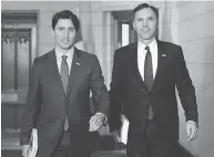  ?? SEAN KILPATRICK / THE CANADIAN PRESS ?? Finance Minister Bill Morneau said the PBO’s report reinforces the idea that spending will help the economy.