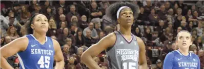  ?? (Photo by Jason Cleveland, SDN) ?? Mississipp­i State center Teaira McCowan, middle, lines up on the free-throw line along with Kentucky players Alyssa Rice (45) and Akenzie Cann on Sunday.