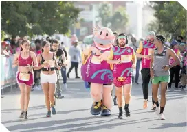  ?? ?? Un gran número de corredores se dio cita para participar en el evento de Mérida.