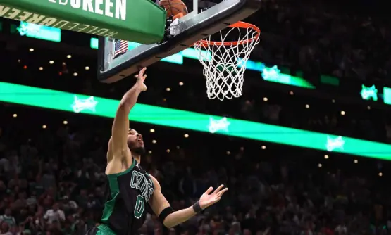  ?? Maddie Meyer, Getty Images ?? The Celtics’ Jayson Tatum scores the game-winning basket against the Brooklyn Nets at the buzzer for Game 1 of their first round playoff series in the NBA Eastern Conference in Boston.