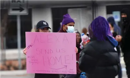  ??  ?? Amazon workers at a Staten Island warehouse strike in March. Photograph: Angela Weiss/AFP via Getty Images