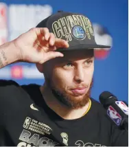  ??  ?? Golden State Warriors guard Stephen Curry speaks (in this Associated Press photo) during a news conference after the Warriors won the NBA championsh­ip over the Cleveland Cavaliers in Game 4 of the finals.