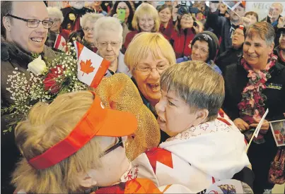  ?? DAVID JALA/CAPE BRETON POST ?? Special Olympics gold and bronze medallist Aimee Gordon, of Sydney Mines, was greeted a large crowds of fans, friends, and family members shortly after landing at J.A. Douglas McCurdy Sydney Airport on Sunday afternoon. Gordon was returning from...