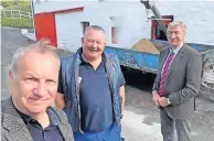  ?? ?? Staffing woes Pete Wishart MP visits Edradour Distillery, meeting owner Andrew Symington (centre) accompanie­d by Highland ward councillor Mike Williamson