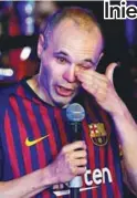  ??  ?? Barcelona’s Andres Iniesta wipes his tears during a tribute after the Spanish La Liga match against Real Sociedad at the Camp Nou stadium on Sunday. –