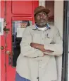  ?? AP ?? Businessma­n Homer King outside his store in Marion. King says he is praying for President Trump despite misgivings about his election. —