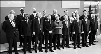  ??  ?? De verschille­nde wereldleid­ers op de Libië-top in Berlijn. (Foto: NU)
