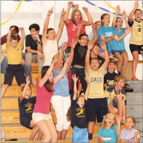  ??  ?? A-C-E-ACE! The Oakwood Christian Academy student section gets into the action as they cheer on their high school volleyball team during the first varsity match of the season last week in Chickamaug­a. (Messenger photo/Scott Herpst)