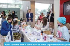 ?? ?? KUWAIT: National Bank of Kuwait holds its annual Girgian event at NBK Specialty Hospital and Stem Cell Therapy Unit, at Al Sabah Medical district, to celebrate with the children the happy moments of Girgian and present them with felicitati­ons and gifts.
