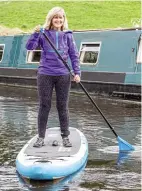  ?? PHOTO: CHARLOTTE GRAHAM ?? Jo Mosely became the first woman paddleboar­der to complete the challenge, raising £1000 in the process.