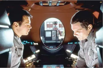  ?? | MGM ?? Astronauts on their way to Jupiter ( Gary Lockwood, left, and Keir Dullea) grow suspicious of their ship’s computer, “Hal,” in “2001: A Space Odyssey,” screening at the Music Box Theatre beginning Friday.