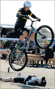  ??  ?? OVER HE GOES: Stunt rider Dylan Victor entertaine­d the crowds at the Race Village