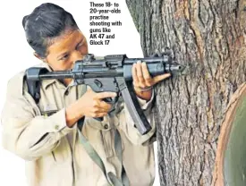  ??  ?? These 18- to 20-year-olds practise shooting with guns like AK 47 and Glock 17