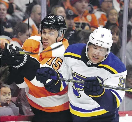 ?? DERIK HAMILTON/THE CANADIAN PRESS ?? Scottie Upshall, right, who played with St. Louis last year, will enter camp with the Oilers on a profession­al tryout, with hopes of making the team as a fourth-line winger.