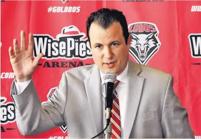  ?? JIM THOMPSON/JOURNAL ?? Former New Mexico Aggie coach Paul Weir meets the media as UNM’s replacemen­t for Craig Neal.